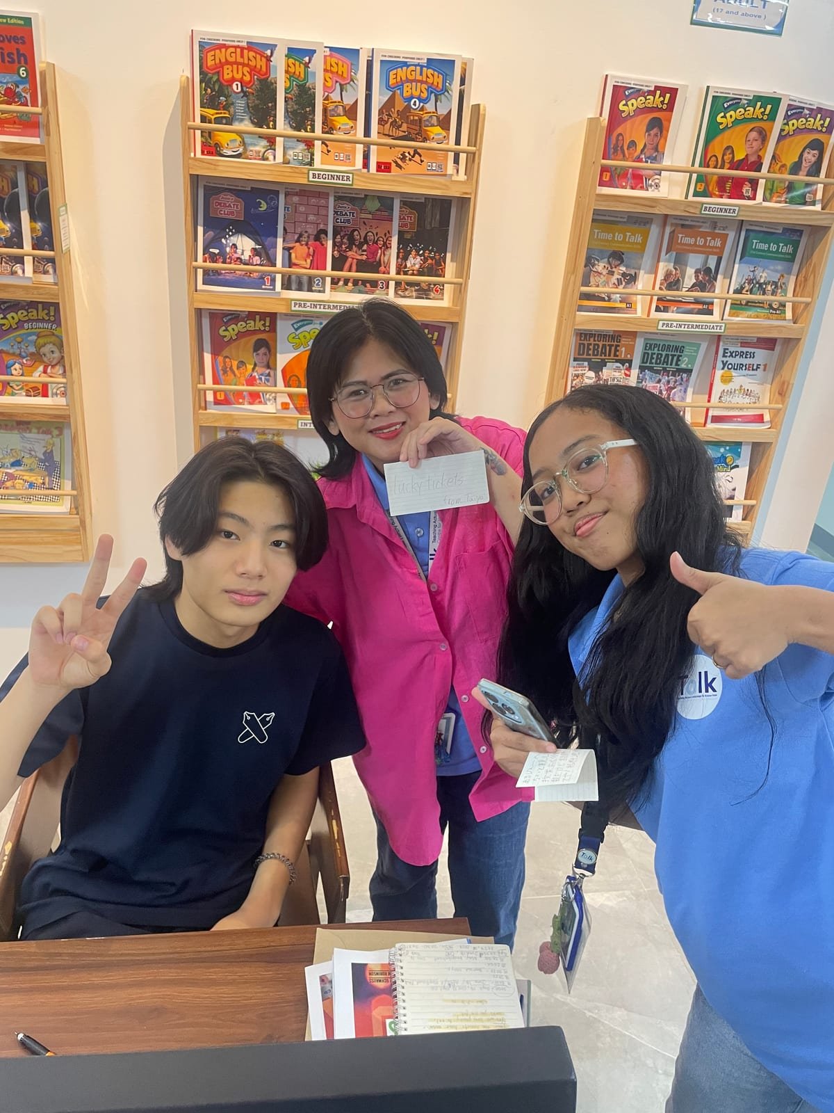 With a staff member in the library lounge