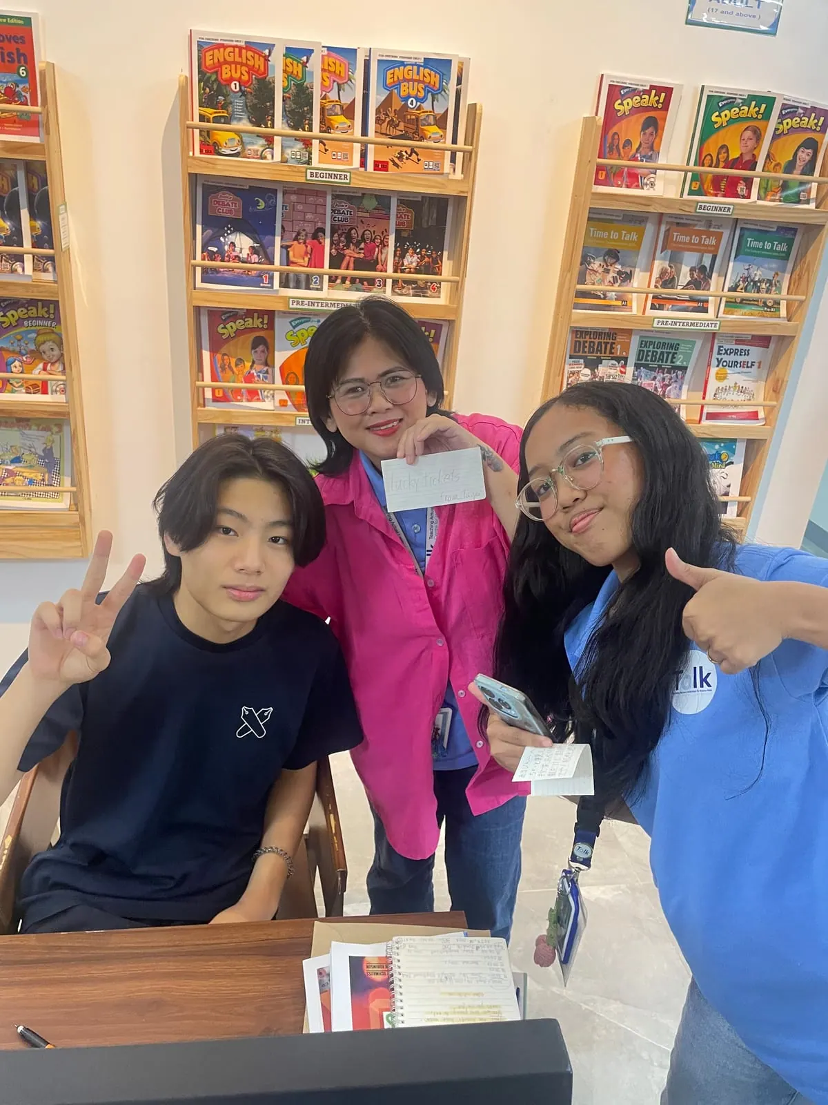 With a staff member in the library lounge