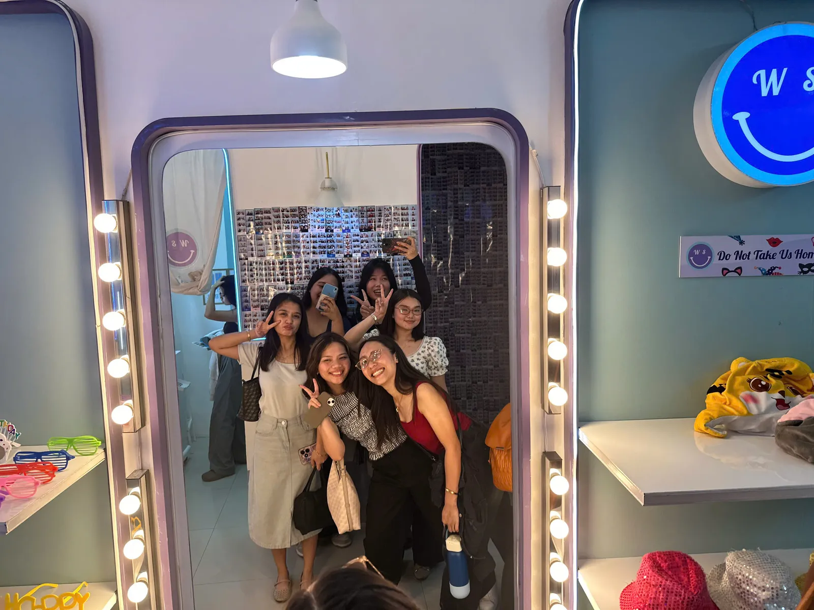 Students posing together in a photo studio