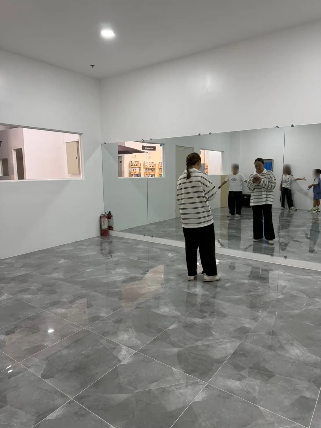 The school dance room with a mirrored wall