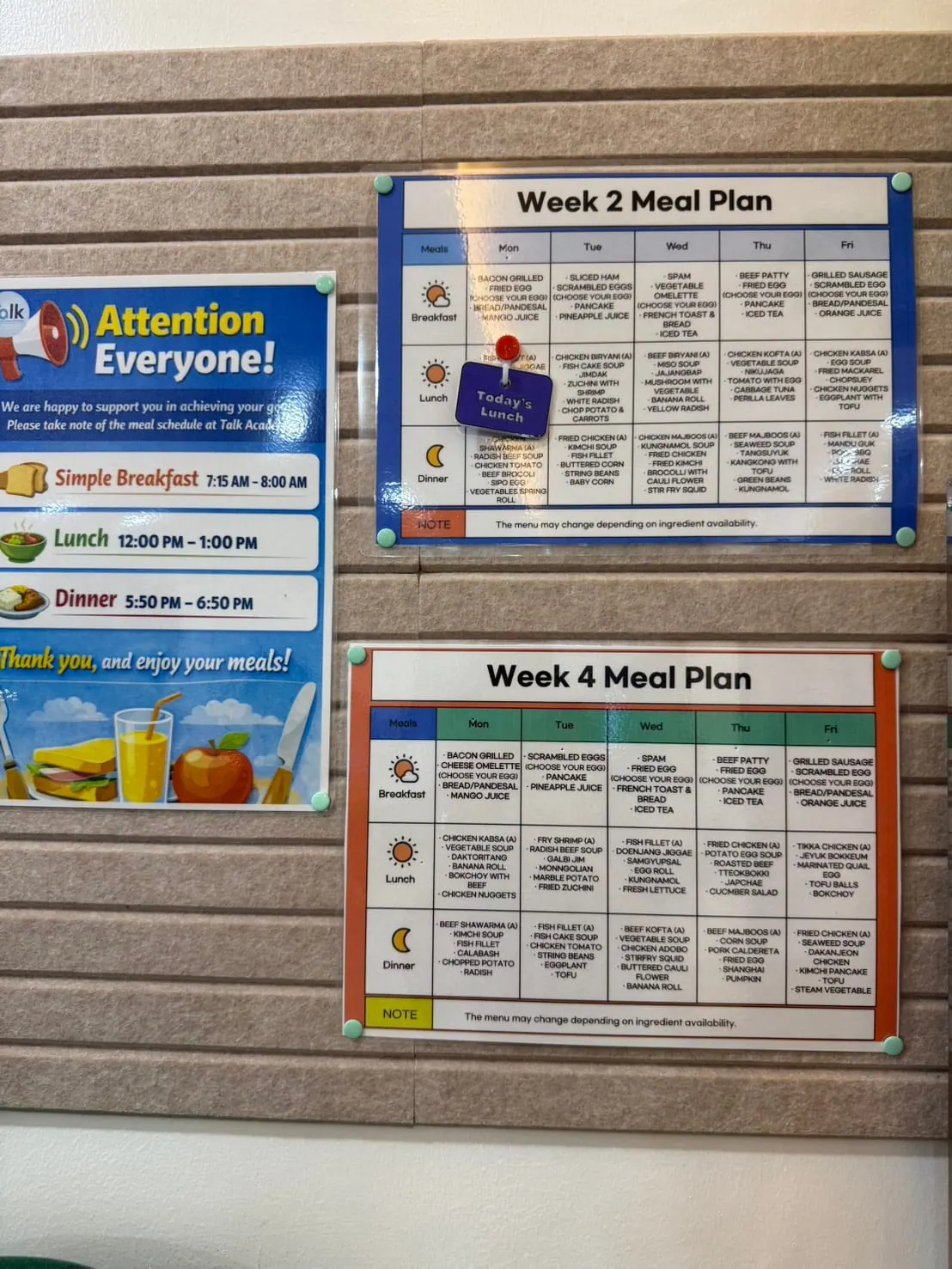 The weekly menu board on the canteen wall